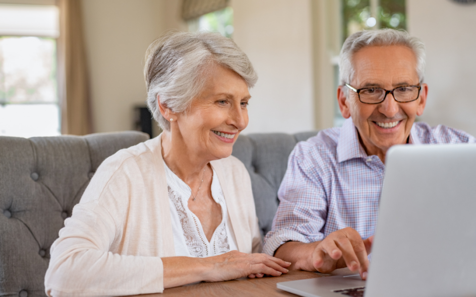 When an Elderly Relative Needs Care: What Are Your Care Options and What Should You Look For? 1 elderly care options - couple sitting at a laptop researching care options